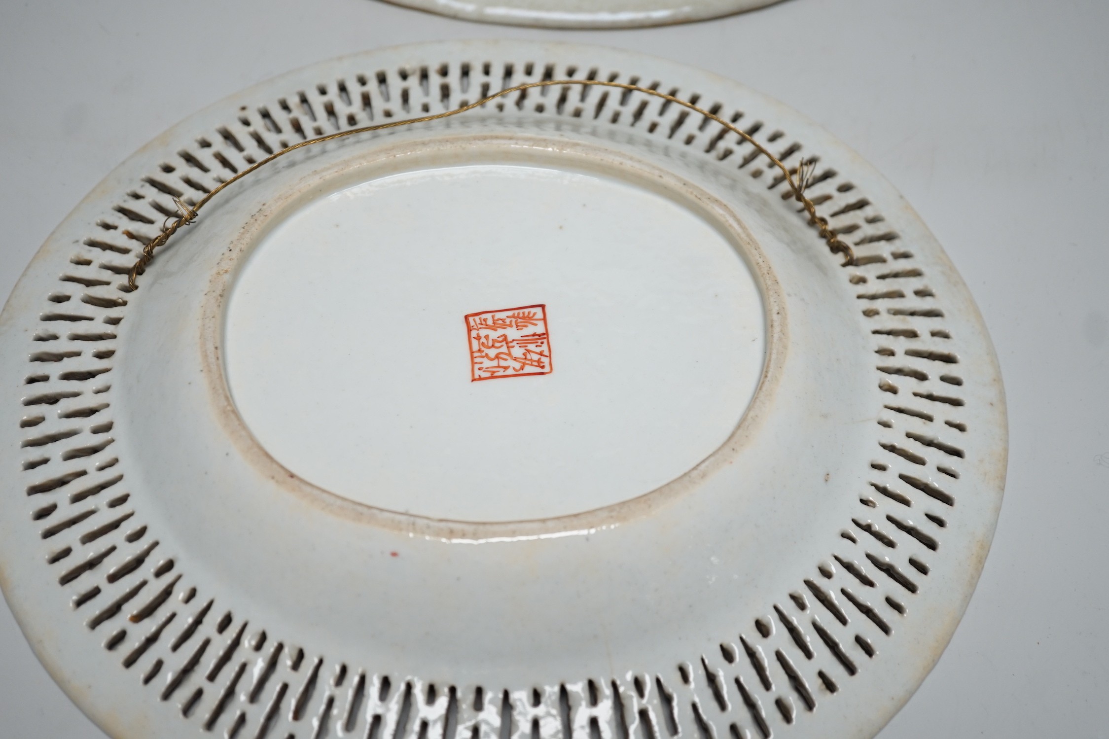 A pair of late 18th century Chinese chestnut basket stands with Dutch over enamelled decoration, 27.5cm